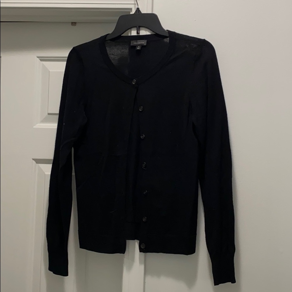 The limited black cardigan